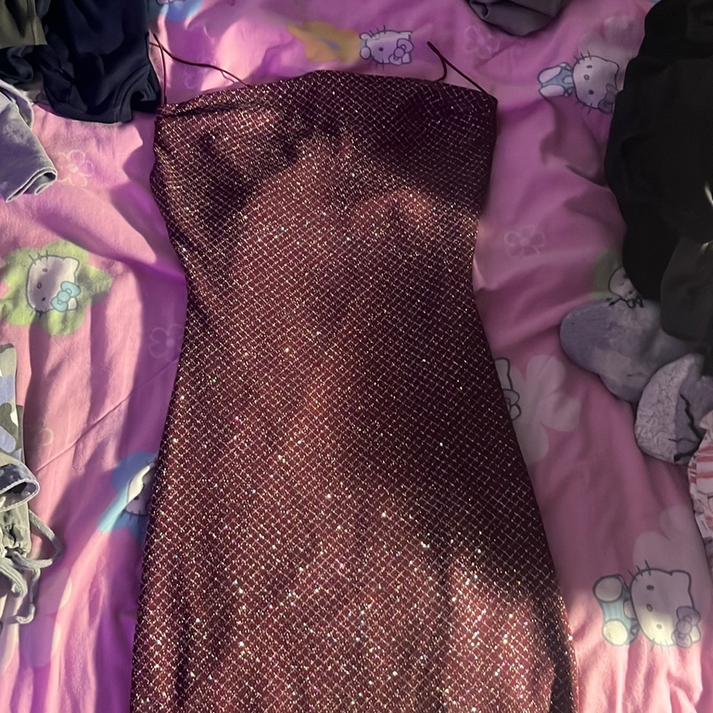 Red sparkly dress, perfect for special occasions.
